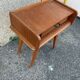 Bedside table with compass feet