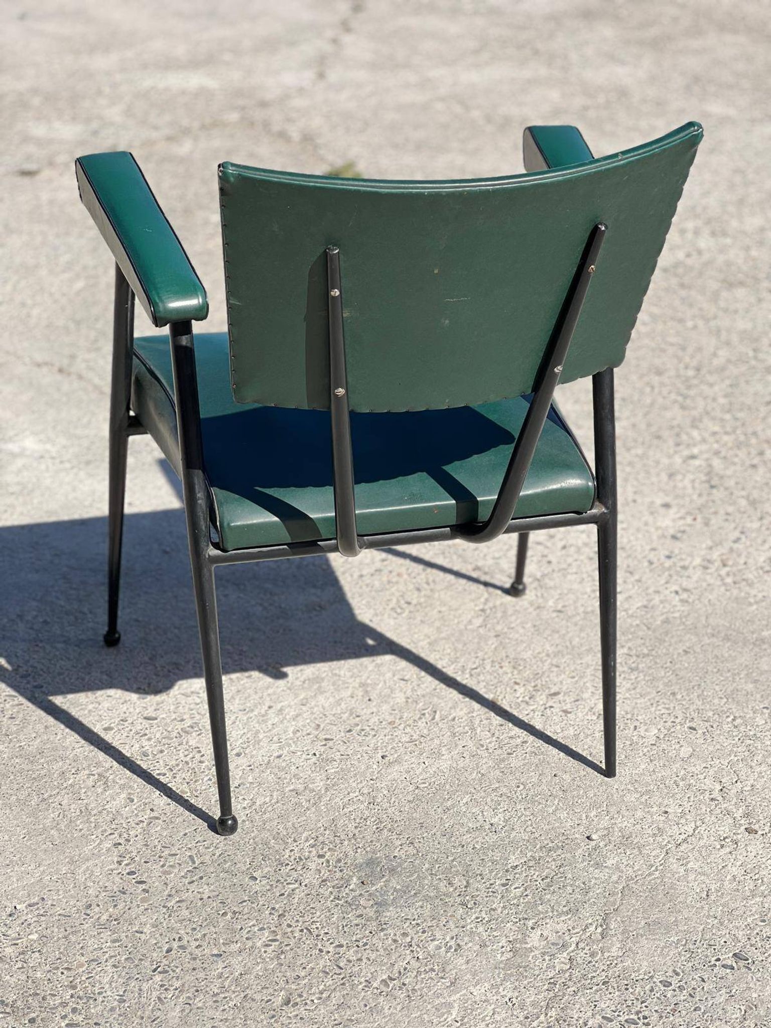 Rare green leatherette armchair, by "Colette Gueden", designer from the 1950s