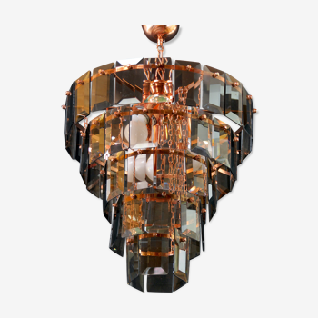 Mid-century brass and smoked glass five tier chandelier