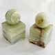 Pair of sculptural mid-century bookends in Onyx, Italy.
