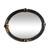 Oval frame decorated with 19th century flowers