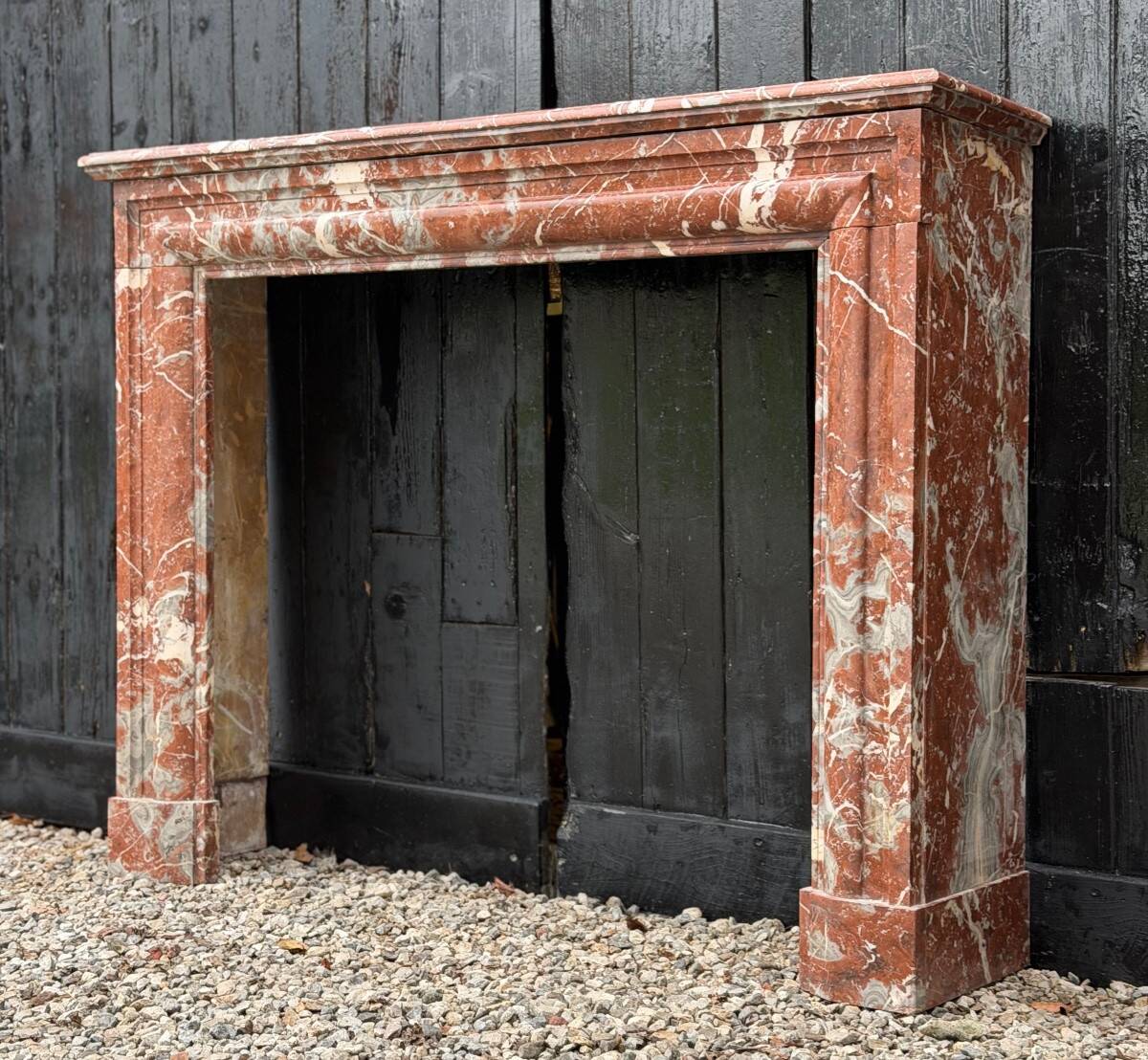 Louis XIV style fireplace in Rance marble, circa 1880.