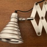 Industrial accordion wall light