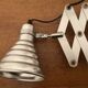 Industrial accordion wall light