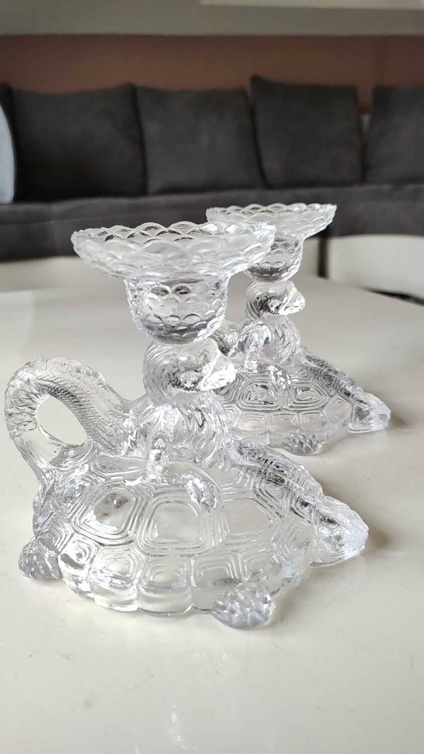 Pair of hand candlesticks/glassware from Portieux/Vallerysthal. In molded glass. Zoomorphic form of turtle carrying a griffin on its back.