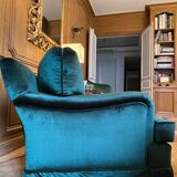 Paire de fauteuils en velours vert avec accoudoirs