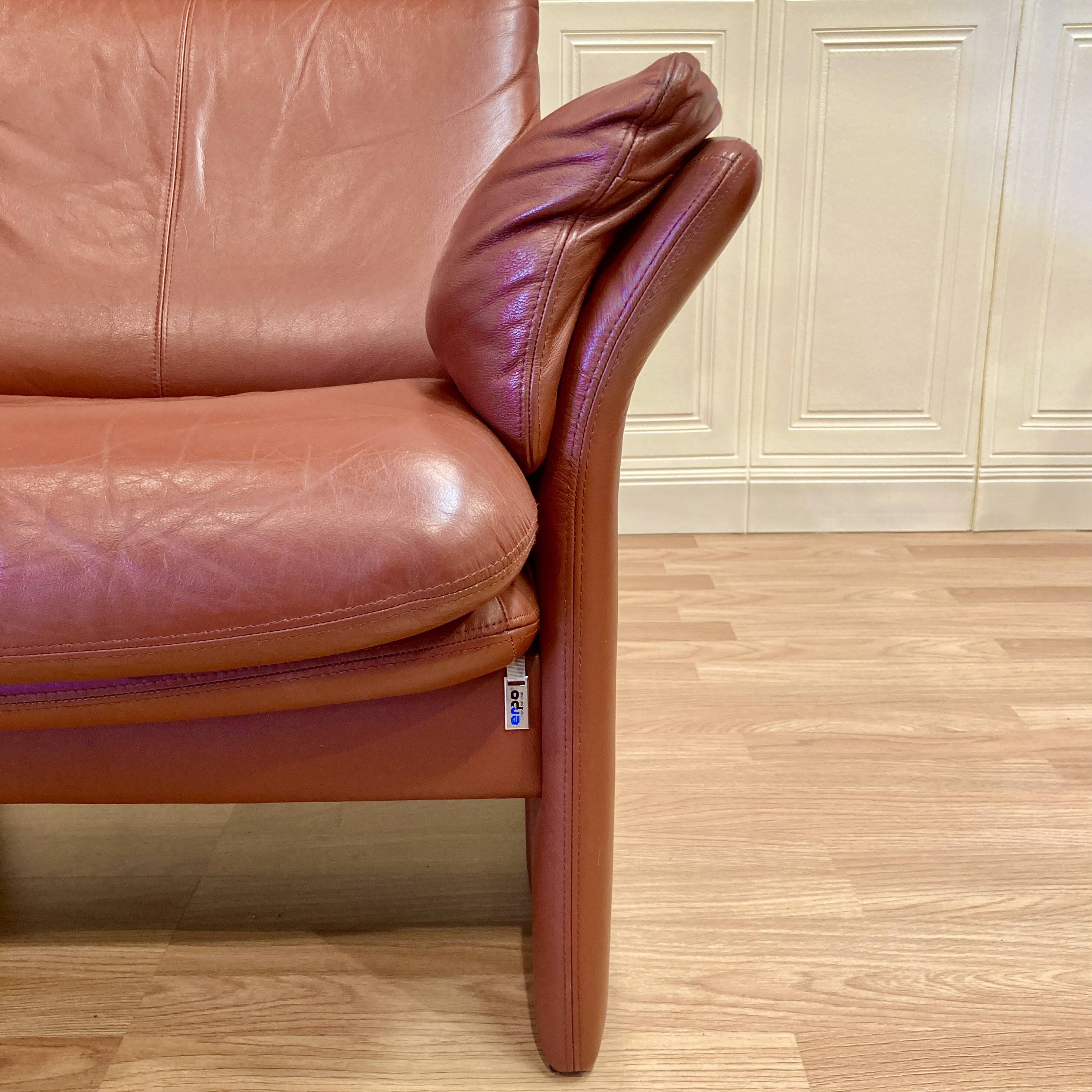Pair of "Erpo" designer adjustable leather armchairs.