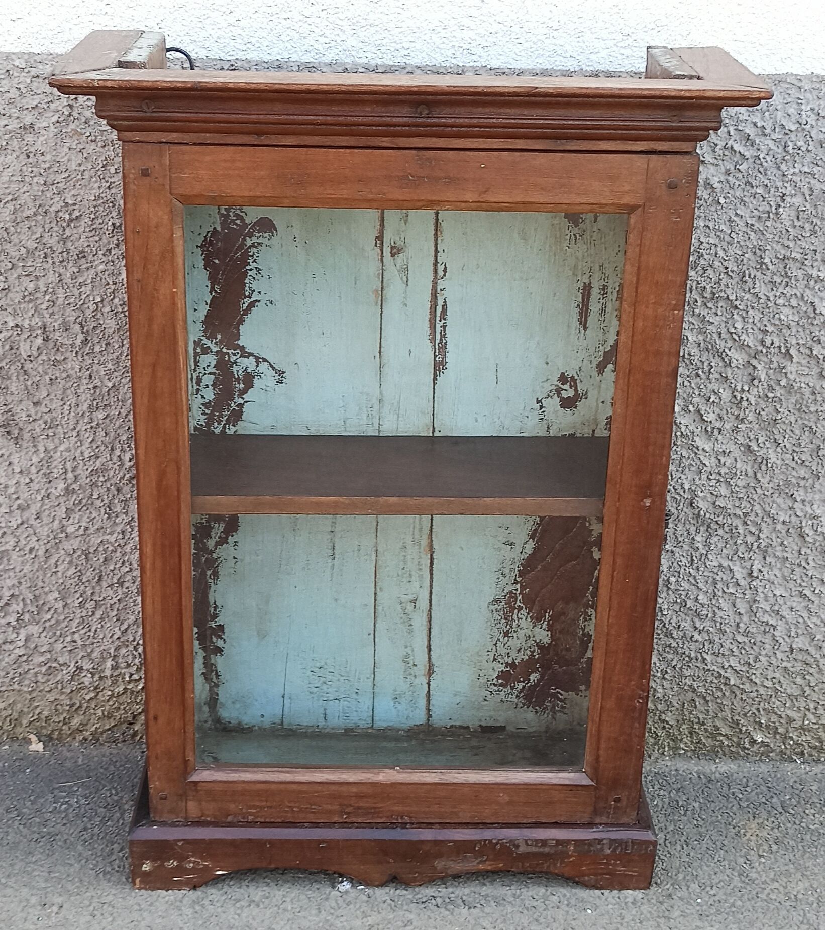 Old wardrobe with glass door