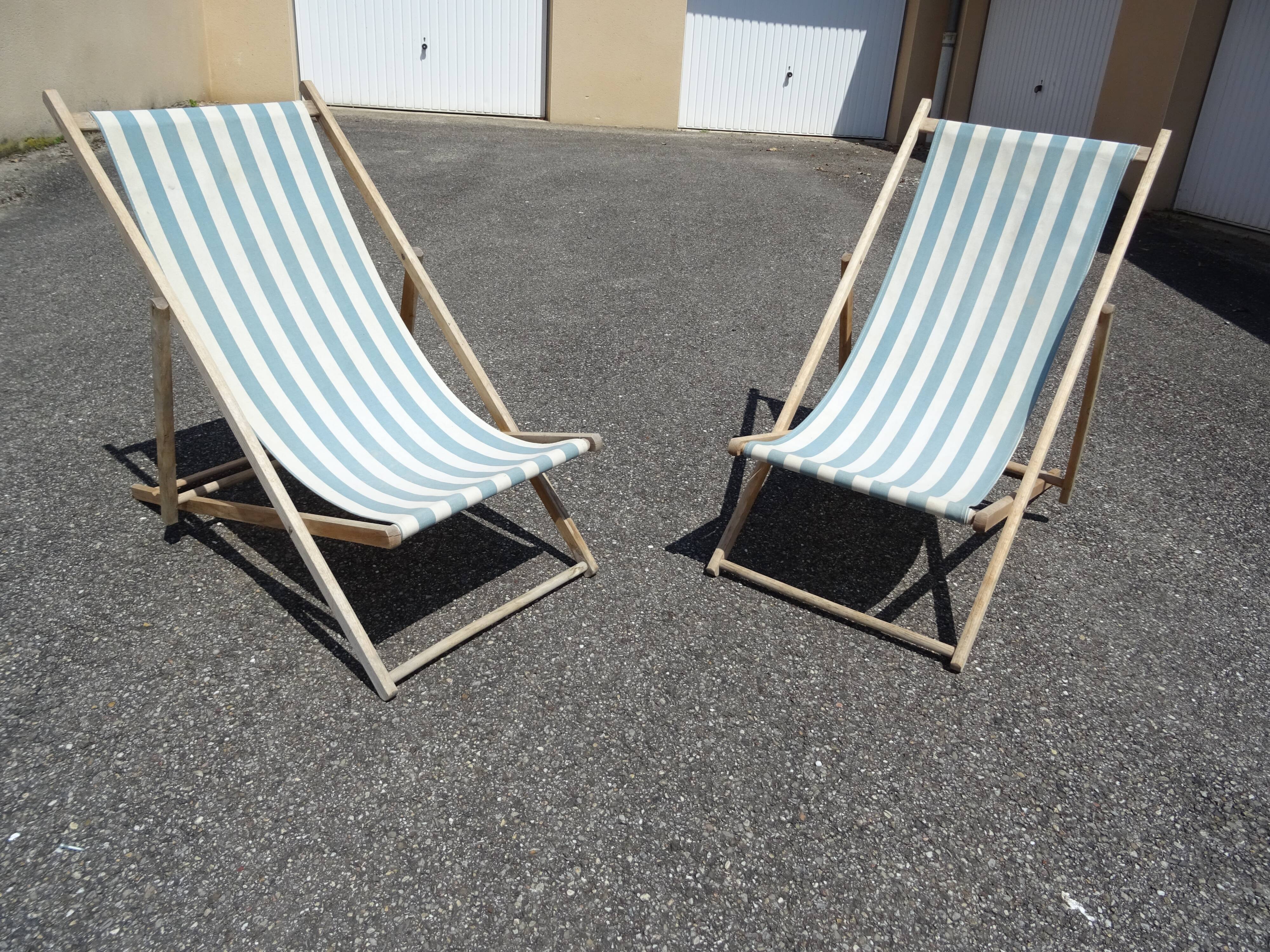 Pair of sun loungers with vintage blue blue stripes