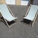 Pair of sun loungers with vintage blue blue stripes