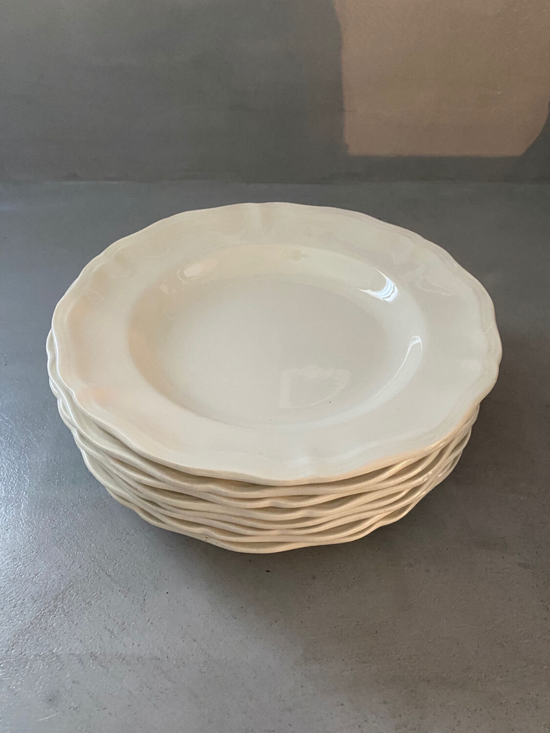 8 white porcelain plates