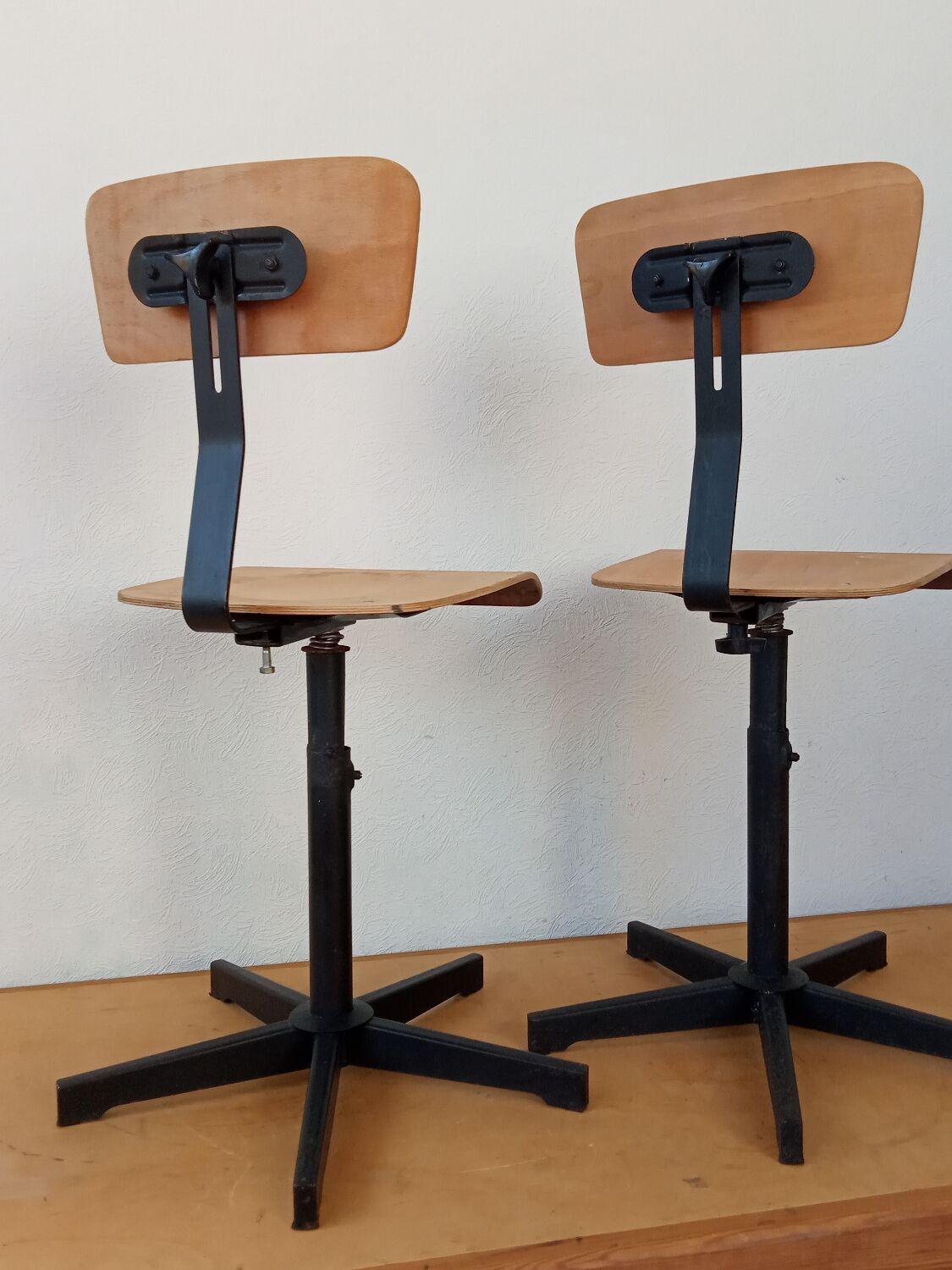 Pair of high workshop bar chairs