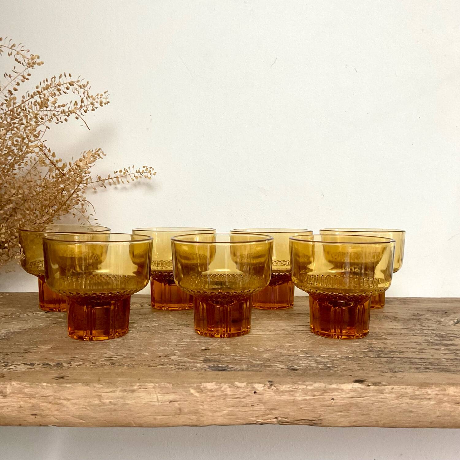 7 small amber glasses