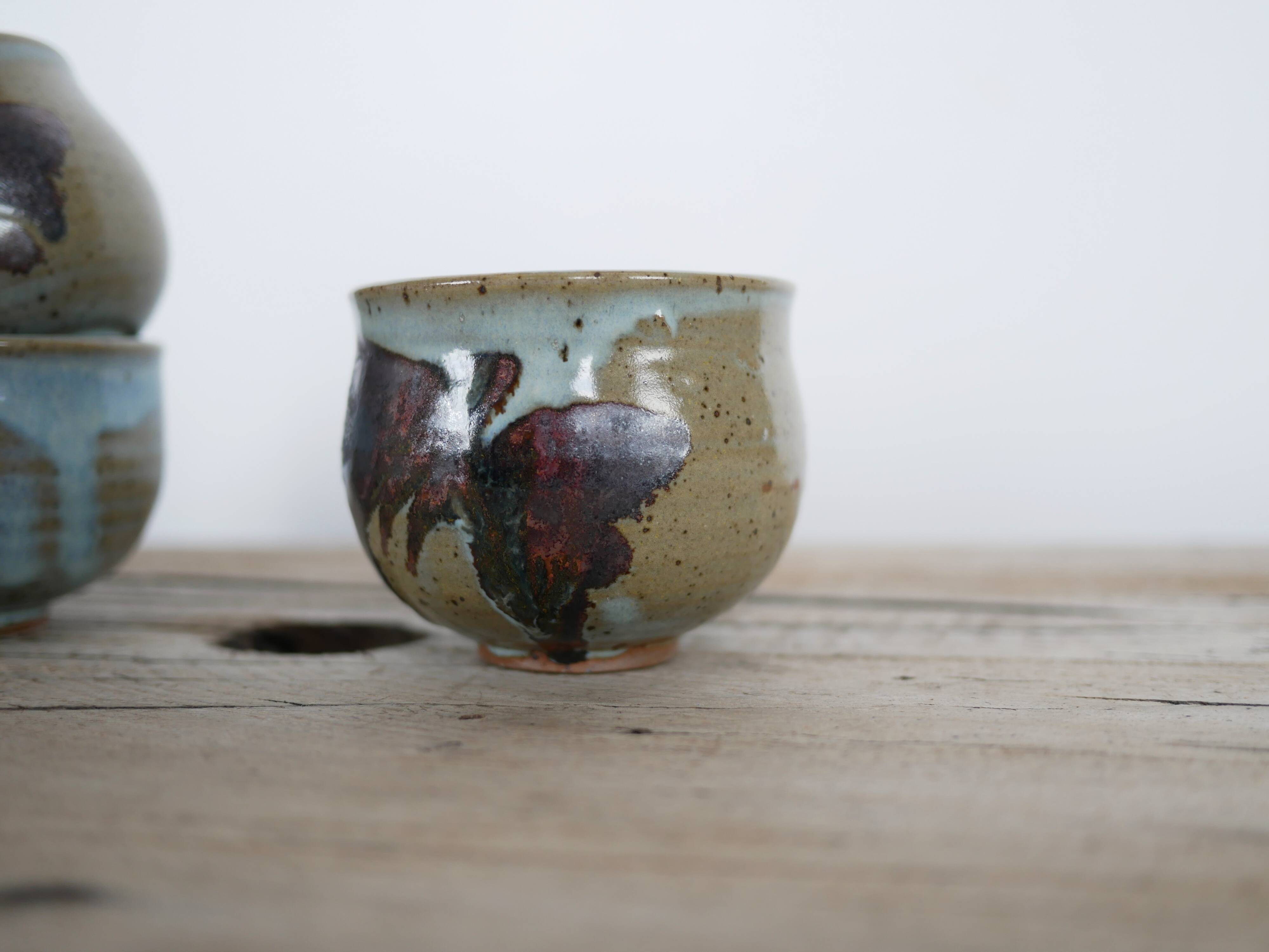 Series of 5 vintage stoneware cups