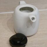 Black and white ceramic coffee maker