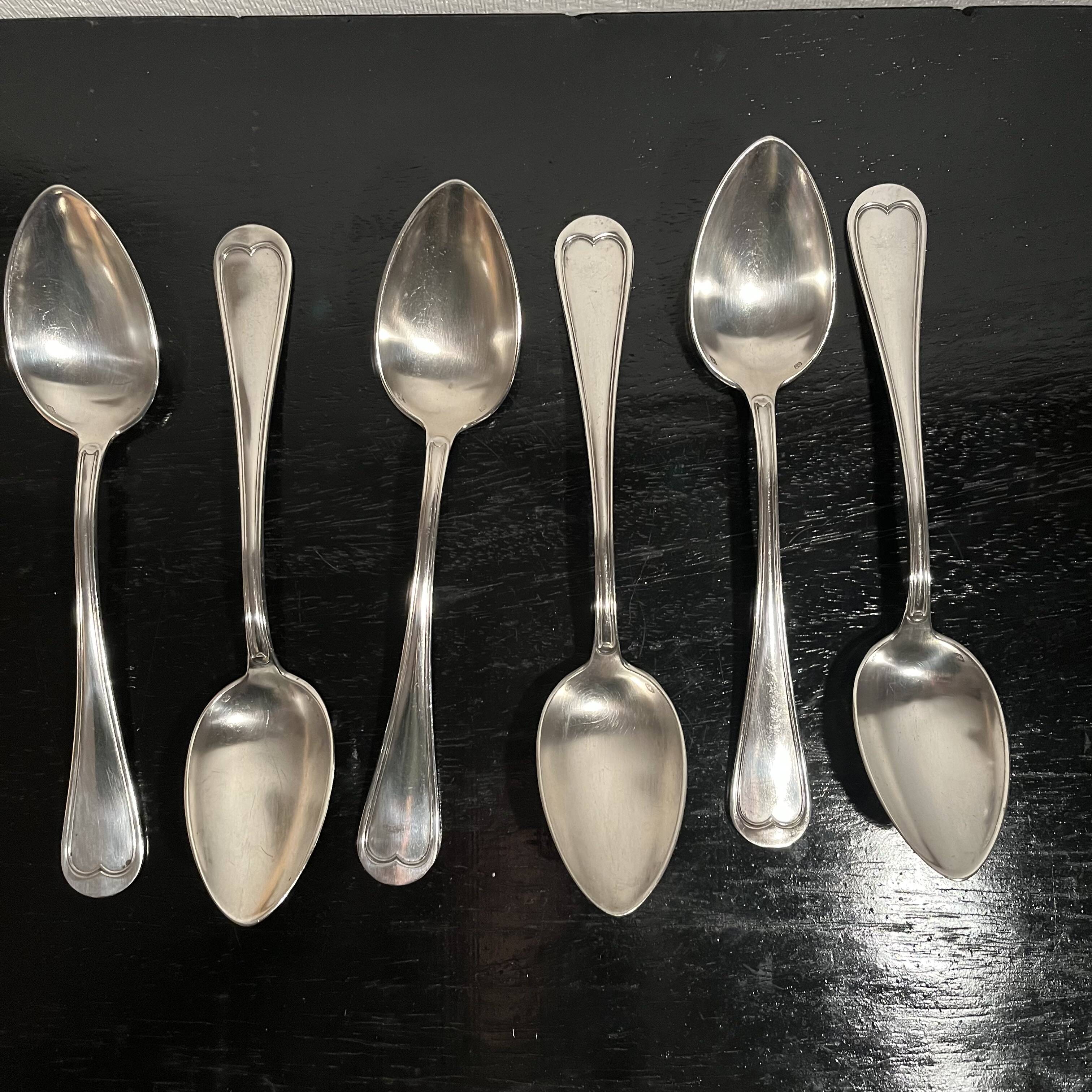 Silver-plated metal soup spoons