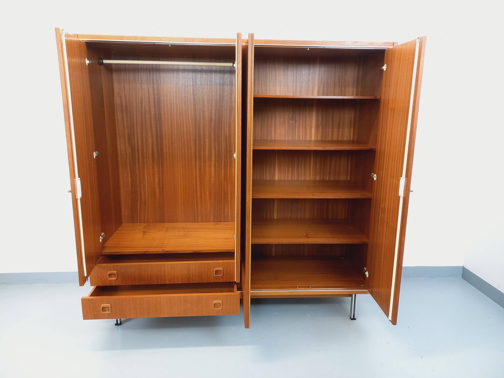 Vintage Scandinavian modernist wardrobe in teak and metal from the 1960s.