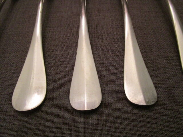 6 old silver metal spoons mismatched for a chic table