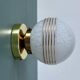 Vintage glass globe wall or ceiling light in white and gold from Clichy.