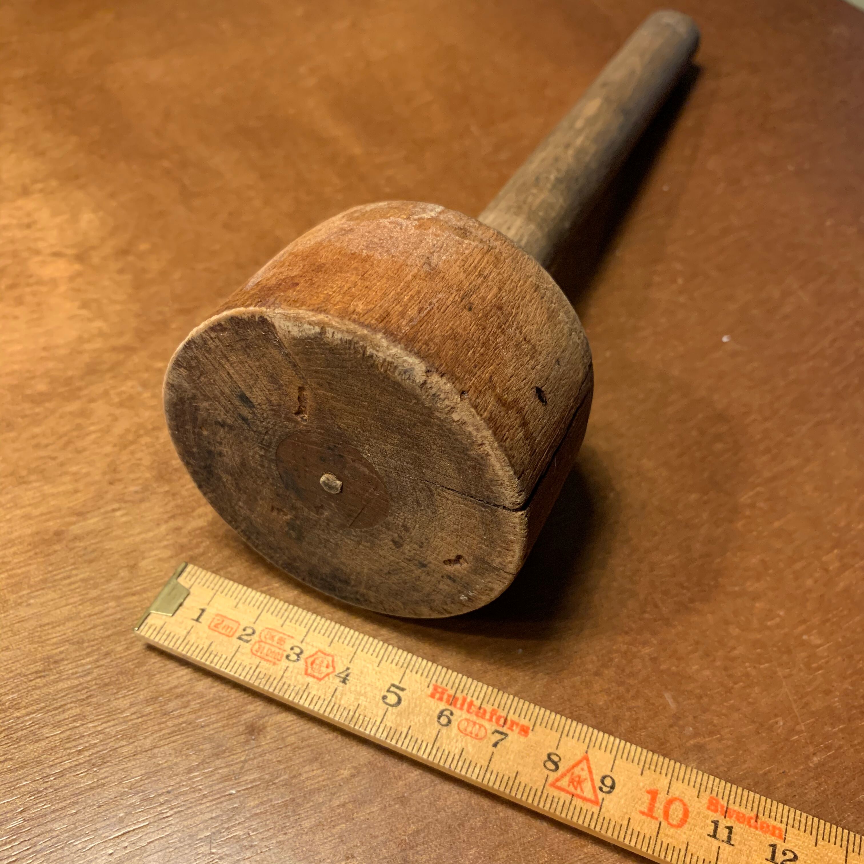 Old wooden pestle