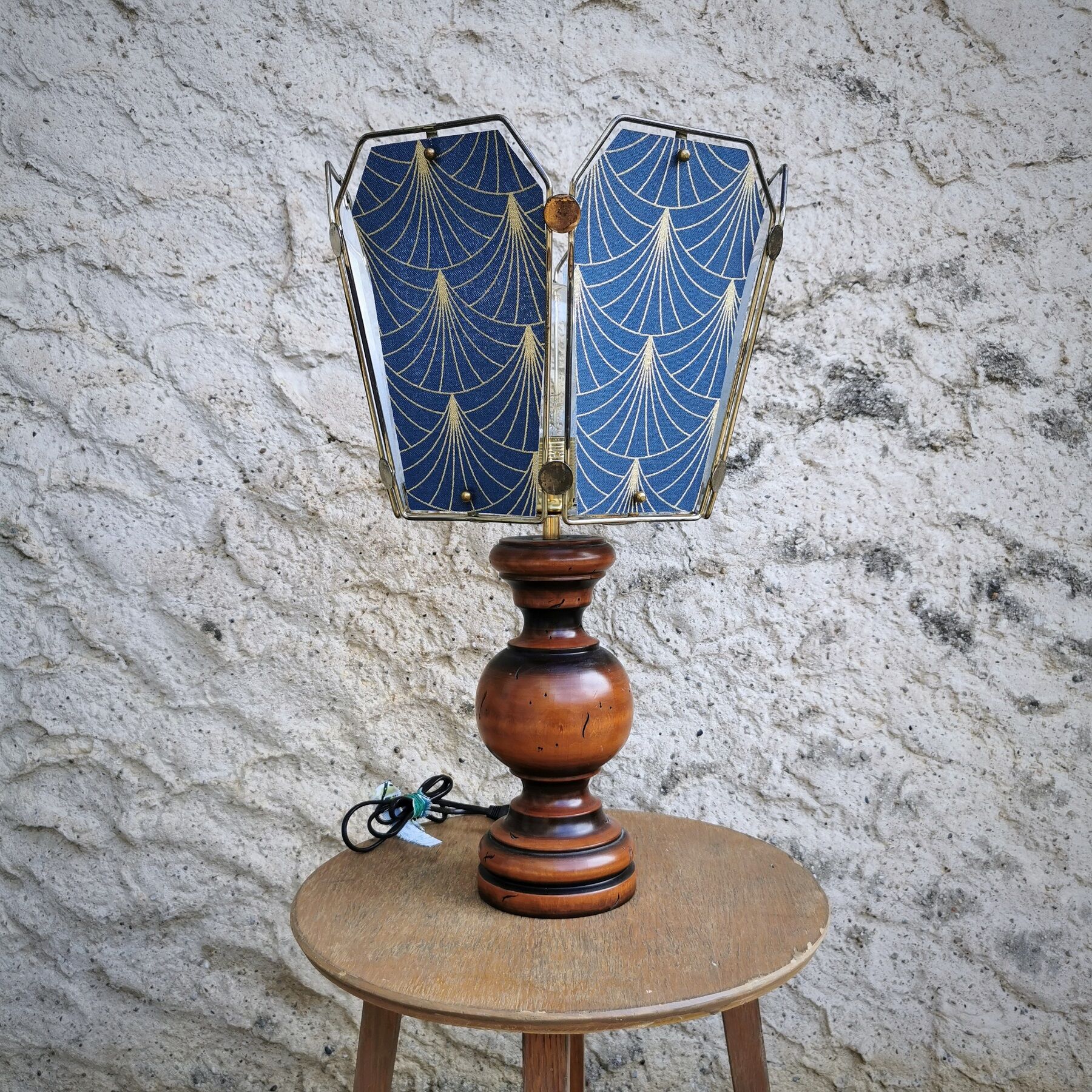 Table lamp, old turned wooden foot, metal lampshade and art deco print