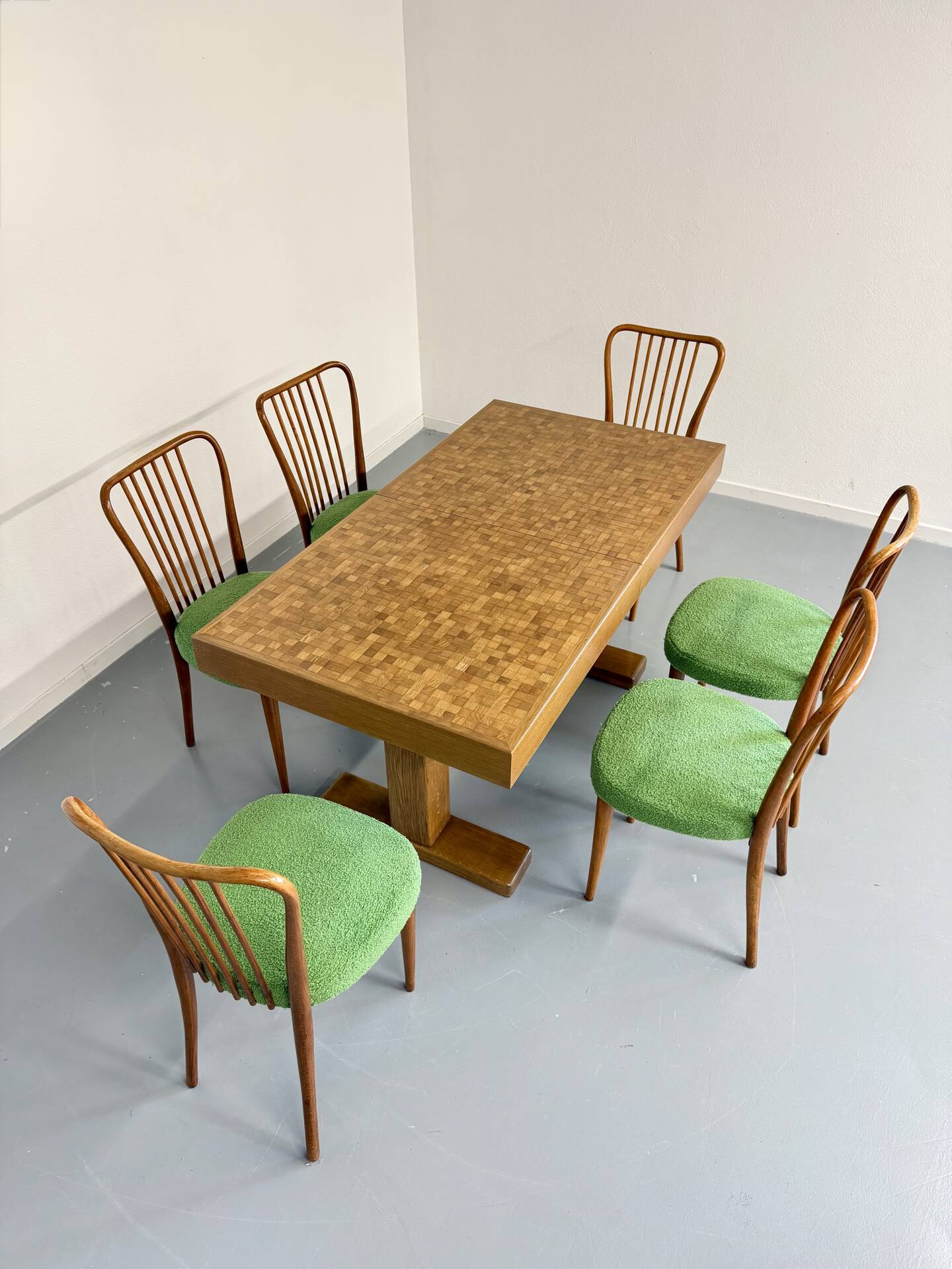 Wooden marquetry dining table designed by Dieter Waeckerlin from the 1960s.