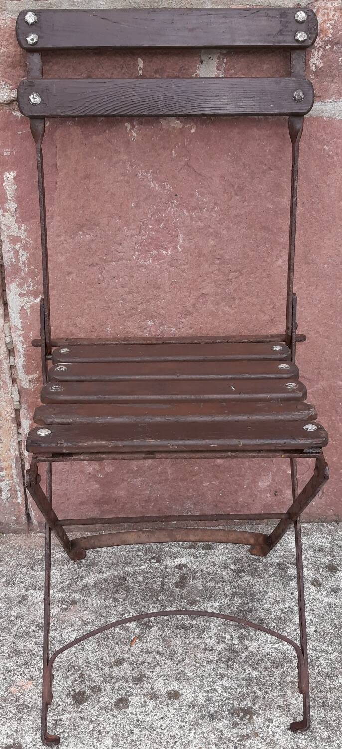 Foldable wrought iron chair