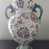 Old porcelain earthenware vase with floral decor