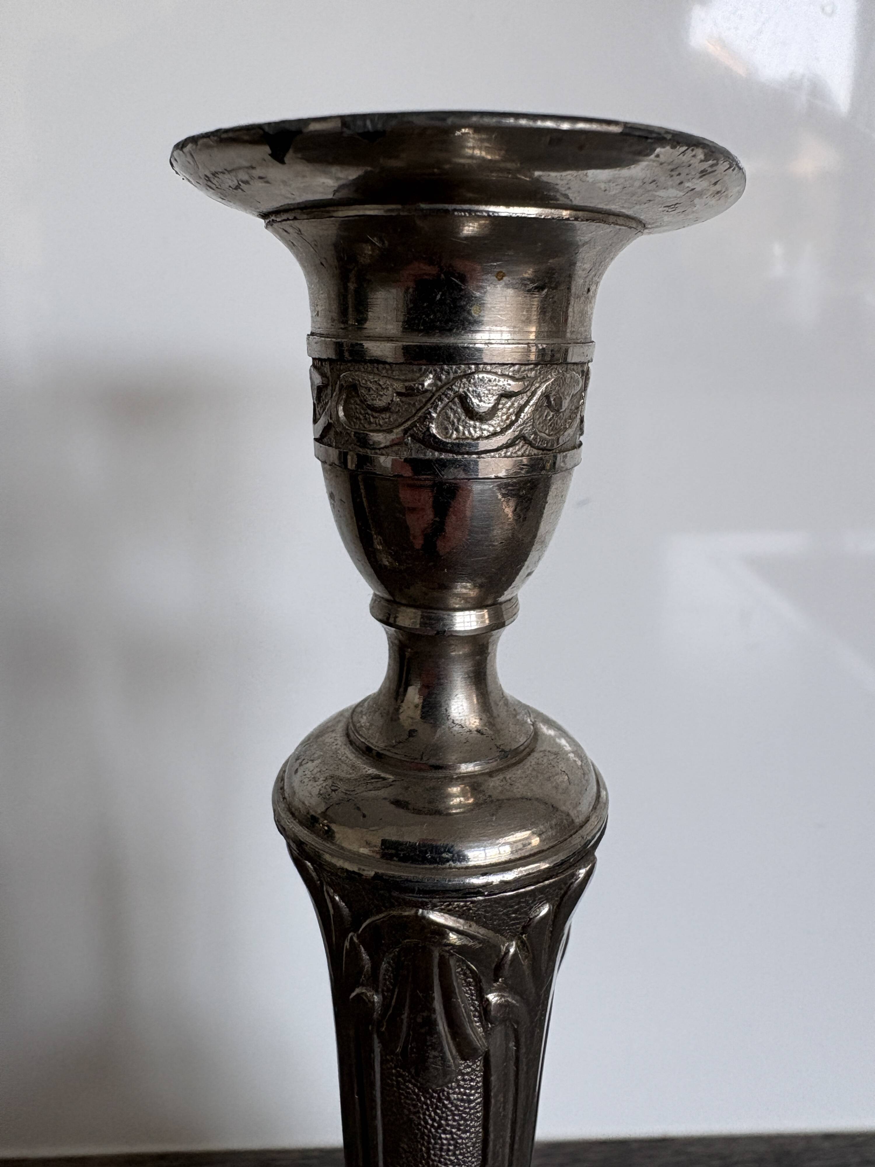 Pair of antique candlesticks