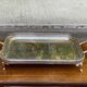 Sculpted silver serving tray