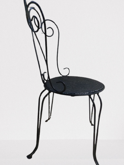 Pair of wrought iron garden chairs