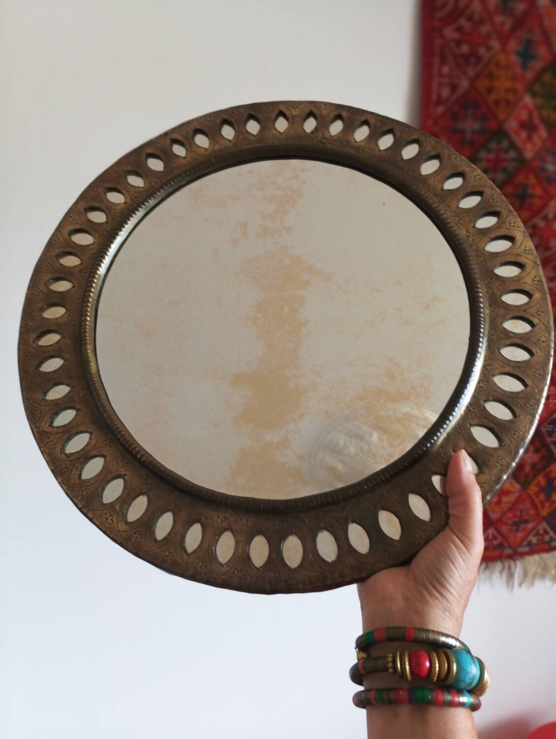 Oriental brass mirror