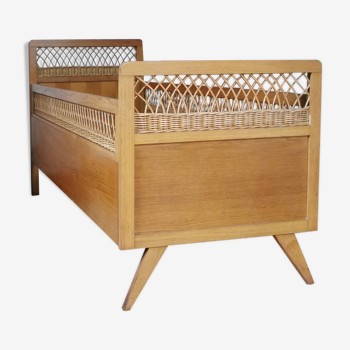 Vintage rattan child bed from the 60s