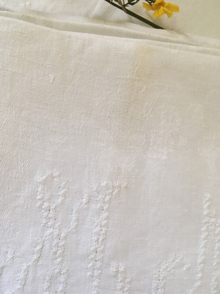 Six damask white towels and embroidered M N.