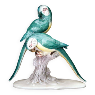 Earthenware figurine, a pair of German porcelain parrots