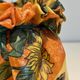 Trompe-l'Œil Ceramic Vase in the Shape of a Knotted Bag with Floral Decoration. Work