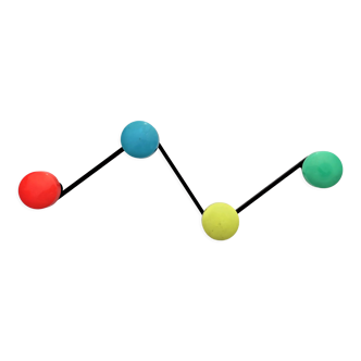 Coat rack with 4 hooks of different colors around 1950