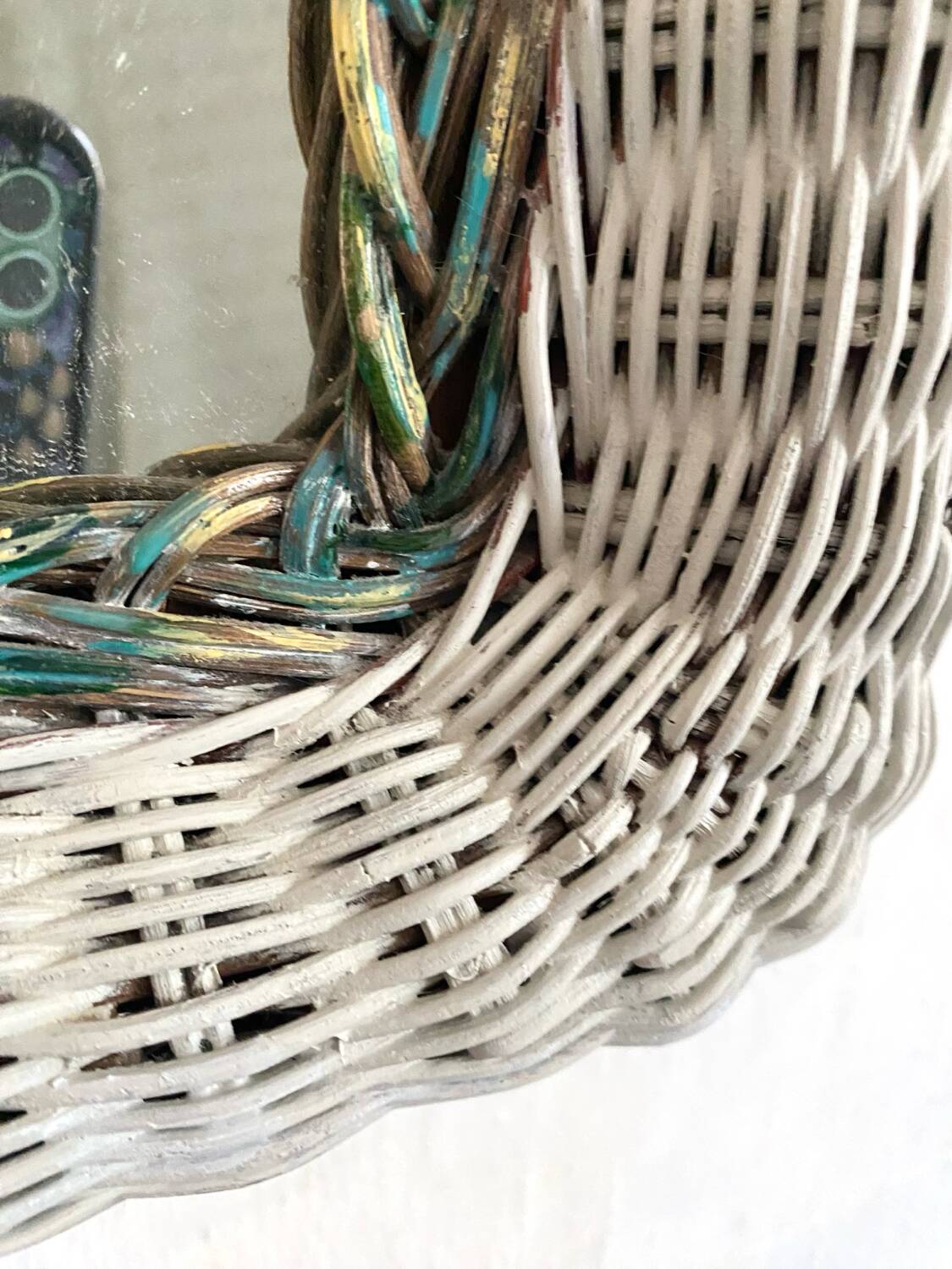 Vintage woven rattan mirror