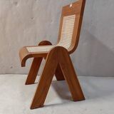 Chaise en bois massif avec assise tressée en rotin