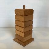 Six wooden egg cups and their Scandinavian style support