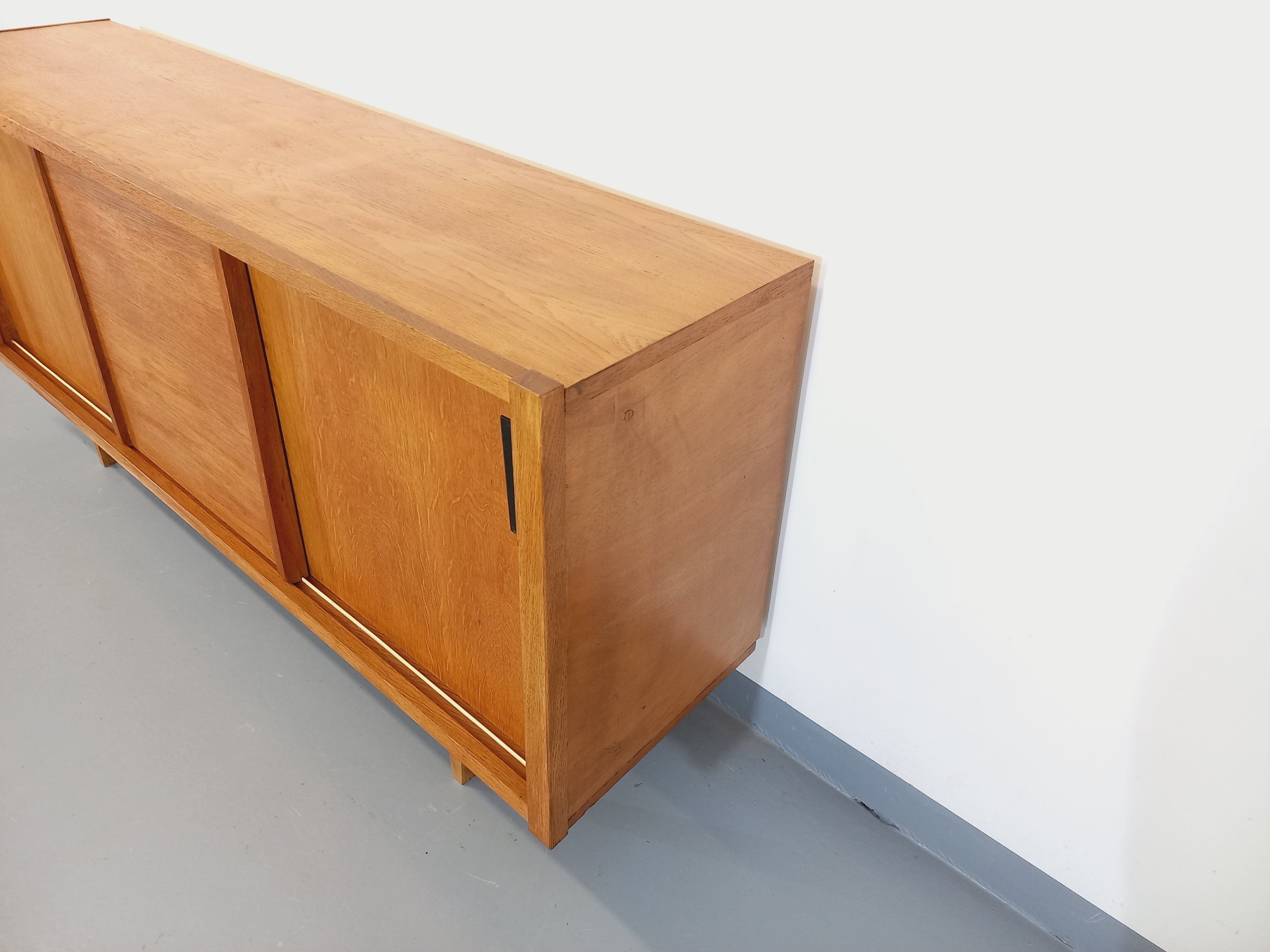 Vintage row in light oak wood from the 60s