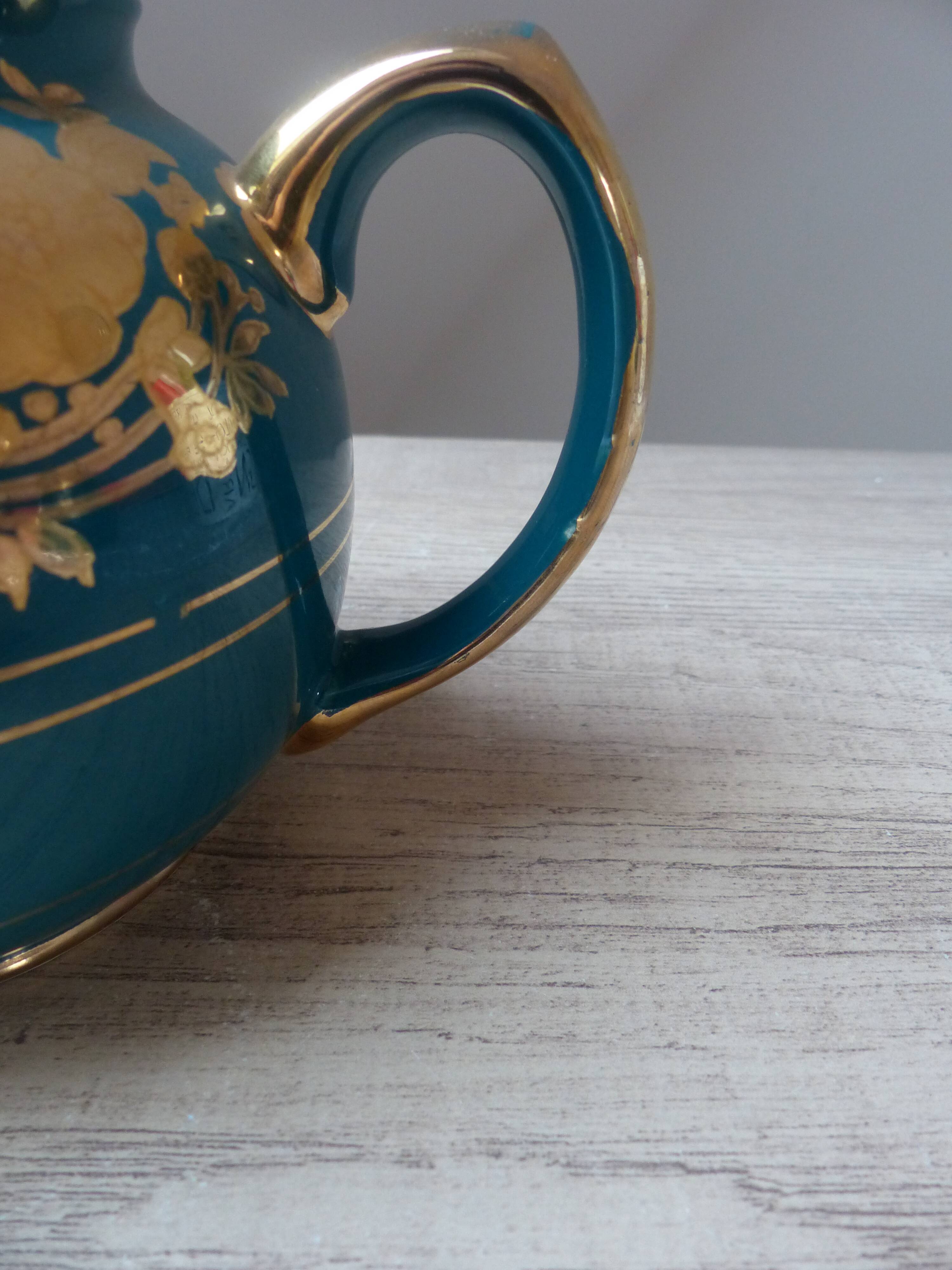 Old small Sadler cream pot in blue green ceramic with gold pattern, English creamer milk pot