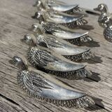 12 silver-plated metal knife rests with duck design