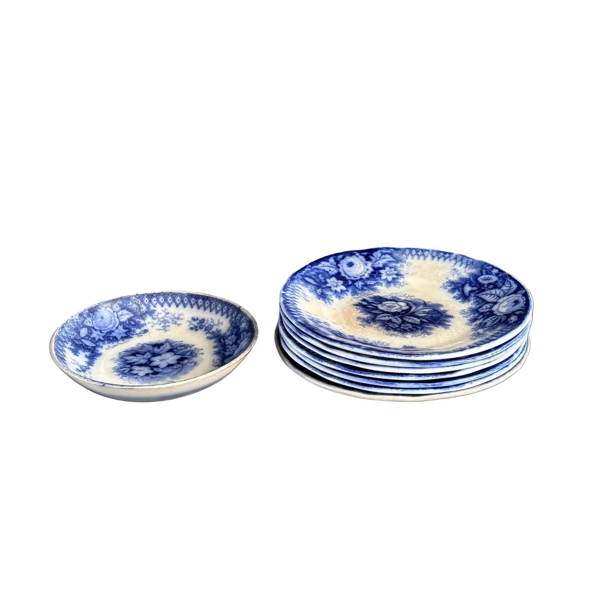 Stack of Sarreguemines plates, jardinière model.