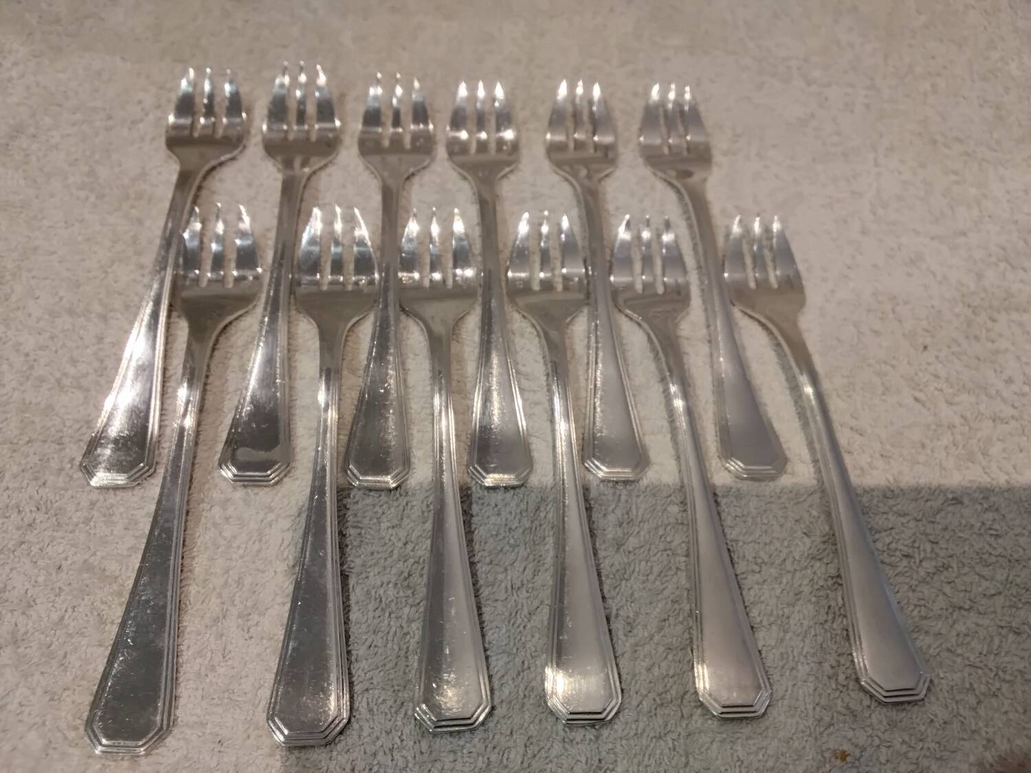 12 silver-plated oyster forks by Christofle America