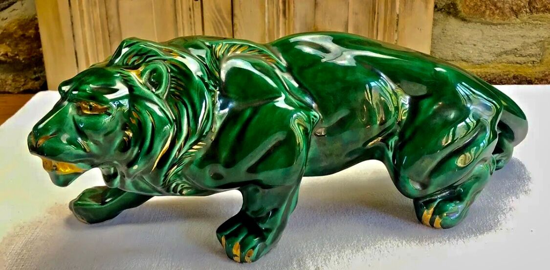 Art Deco lion statue cracked St Clement