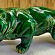 Art Deco lion statue cracked St Clement