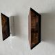 Pair of French wall lights with geometric design in copper, 1960, France.