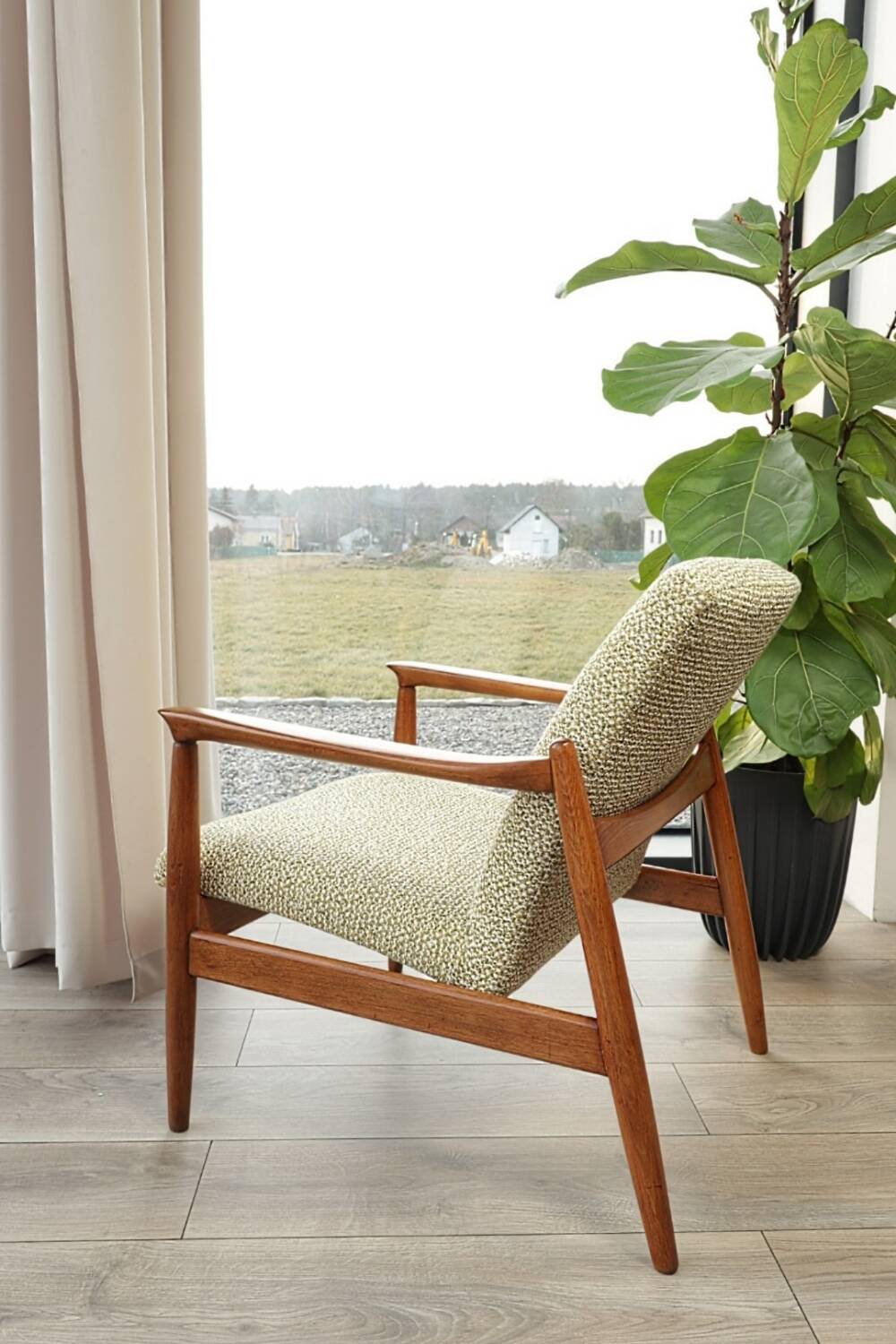Vintage armchair with a green nebula design by E. Homa, 1970.