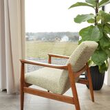 Vintage armchair with a green nebula design by E. Homa, 1970.